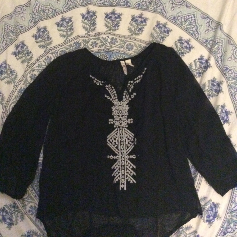 Black, see- through blouse.